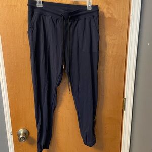 ZYIA Navy Track Pants with gold zipper on ankle